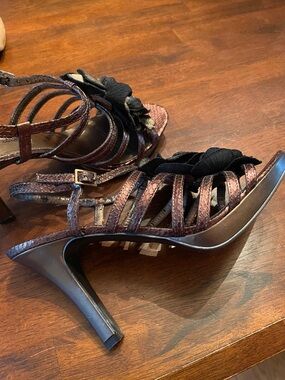 Bandolino Metalic Bronze Strappy Heels with Black Floral Accent